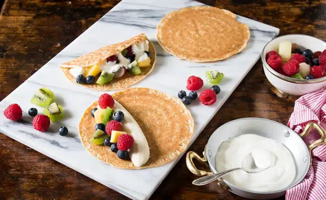 Mini fruit tacos with yogurt drizzle
