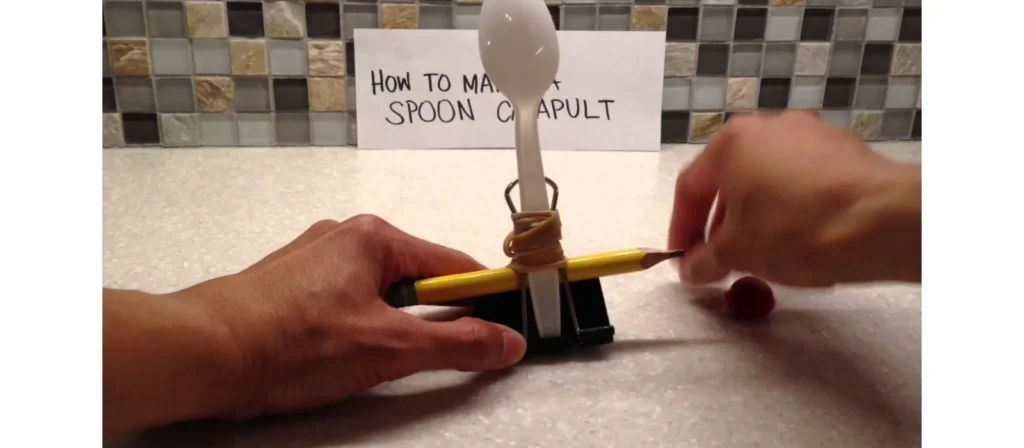 Unlocking Play Schemas: The Essential Guide to Child Development 8 Spoon Catapult Challenge