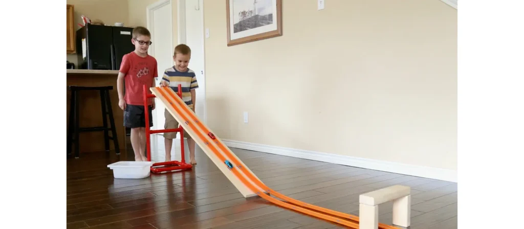 Unlocking Play Schemas: The Essential Guide to Child Development 4 preschool activity Rolling Ramp Racetrack