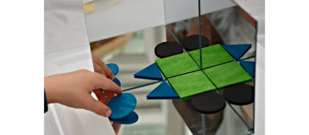 Unlocking Play Schemas: The Essential Guide to Child Development 29 preschool activity Symmetry Studio